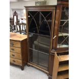 A large stained glazed Victorian mahogany bookcase