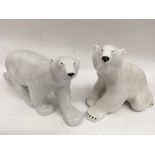 Two large, Russian Lomonosov porcelain polar bear models.Largest 41cm long, no damge or restoration