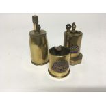 Two brass I World War trench art lighters and an ash tray with Australian Commonwealth Military