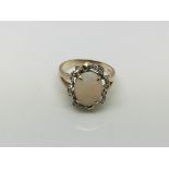A 14ct gold opal and diamond ring, approx 4.3g and approx size P-Q.