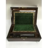 A rosewood writing box with mother of pearl inlay..Approx 25x40cm