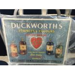 A vintage card multicoloured shop advertising sign for Ducksorths essences and colours. Measures