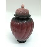 A Carltonware 'Red Rouge' lidded vase, with swirl design.Approx 30cm