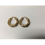 A pair of 9 ct gold hoop earrings 5 grams approx.