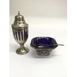 A Victorian, London pierced silver dish with blue liner and a plated sifter