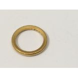 A 22ct gold wedding band.Approx 4.5g