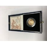 A 9ct gold 1999 proof half sovereign boxed and cer