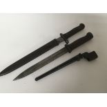 A German bayonet with marks to the blade and two o