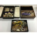 Two boxes of costume jewellery.