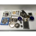 A box containing a collection of plated ware inclu