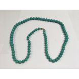 Turquoise bead necklace with silver clasp