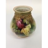 A Royal Worcester bowl painted with roses.Approx 12cm