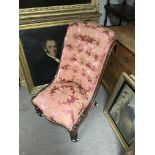 A Red upholstered mahogany bedroom chair.
