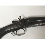 A deactivated double barrel hammer shot gun maker Ancien & Cie of Liege hammer shot gun with side by