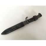 A German Third Reich Hitler youth Knife missing enamel inset.