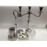 A collection of good quality silver plated items including two wine coasters, a three branch