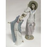 Two Lladro figures in the form of maidens. One 31cm in height, the other 26cm