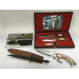 A retrospective copy of a Fairbairn Sykes commando knife plus a hunting knife and some modern