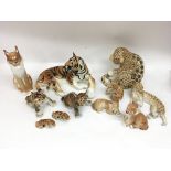 A group of Russian Lomonosov porcelain 'big cat' models including two larger size examples.No damage