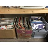 Three boxes of records and cassettes, various arti