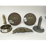 Three Military badges two mounted on plaques and two other examples of I World War Trench Art.