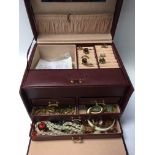 A box of costume jewellery and a collection of cufflinks
