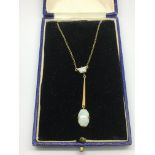 A 9ct gold pendant set with two opals, approx 2.3g.