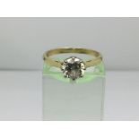 An 18ct gold diamond ring, approx 3g and approx size N.