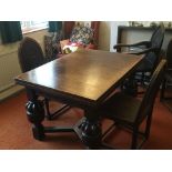 A large oak Jacobean style drawer leaf table the rectangular top on carved bulbous legs and a set of