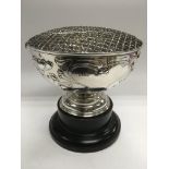 An Art Nouveau silver rose bowl on stand, hallmark