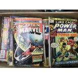 A collection of vintage comics including various Marvel and DC examples.