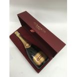 A bottle of Krug Grande Curvee champagne in fitted