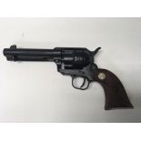 A replica Colt single action revolver, with faux w