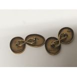 A pair of 18carat gold cufflinks weight 8g.