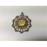 A 1899 half sovereign fitted in a 9 ct gold pendant total weight 18.5 grams