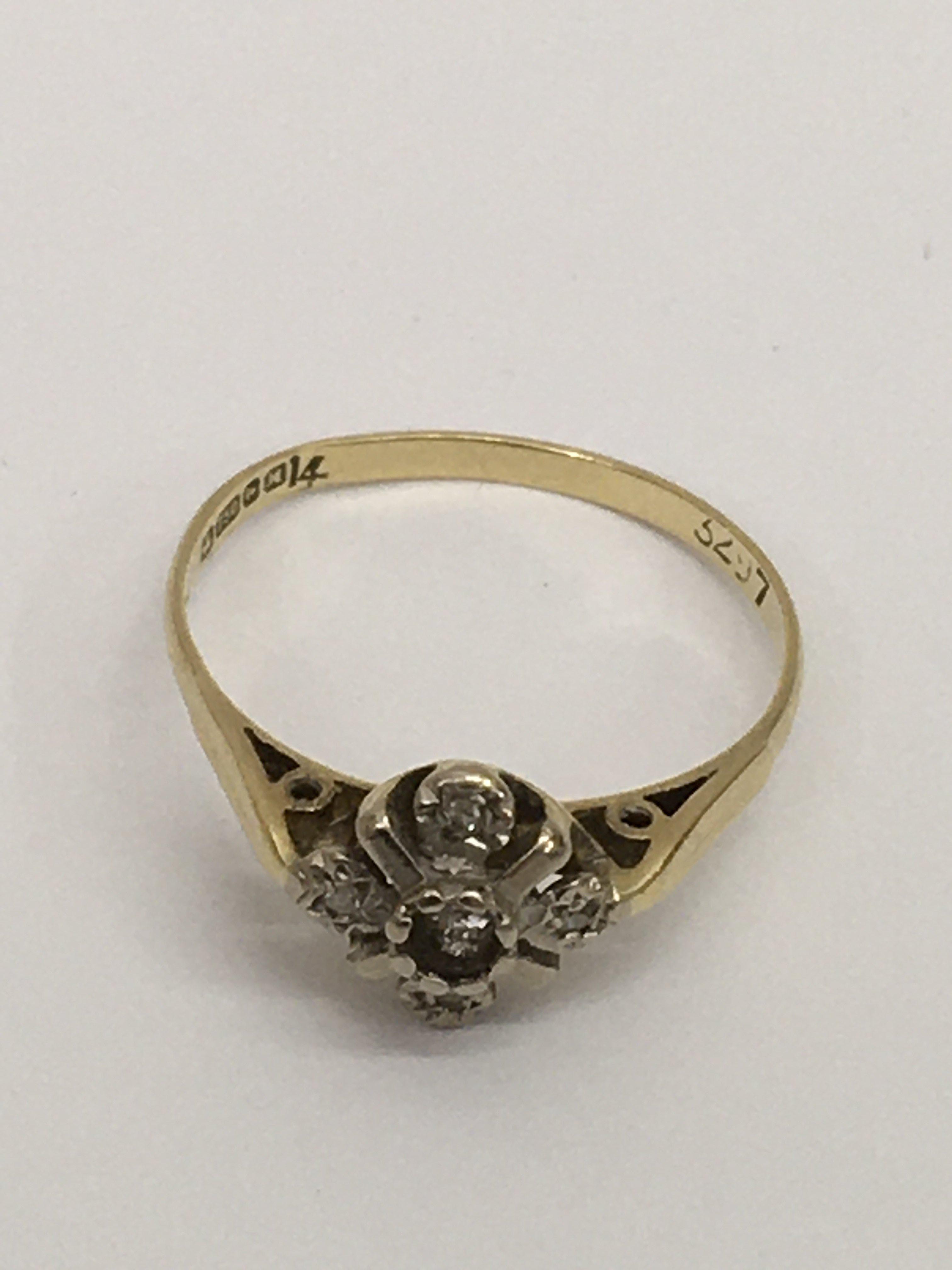 An 18ct gold cluster ring.Approx P, 2.39g