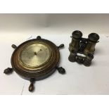 A pair of old brass cased binoculars, a smaller leather cased binocular and a barometer together