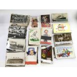 A collection of vintage postcards including Mable Lucy Attwell examples, shipping interest and