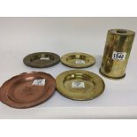 A large trench Art Shell case lighter and copper and brass dishes engraved with military badges