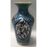 An Islamic Middle Eastern ceramic vase, H.24cm