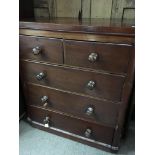 A mahogany chest of drawers fitted with two short and two three Long drawers