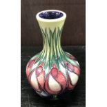 A small Moorcroft pottery Tulip design vase dated 2002