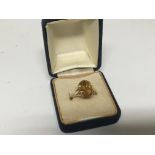 A 9carat gold ring inset with a good size cut citrine stone. Weight 2.5g.