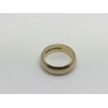 A 9ct gold wedding band, approx 4.3g and approx size J.