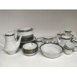 A Japanese Noritake Porcelain dinner set with tea and coffee pots tureens etc