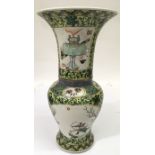 A Chinese Gu shape, famile vert vase having reserves painted with warriors and musicians. Approx