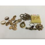 A small quantity of 9ct gold and yellow metal jewellery.Approx
