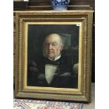 A large Victorian gilt framed an glazed oil on canvas portrait of a gentleman.