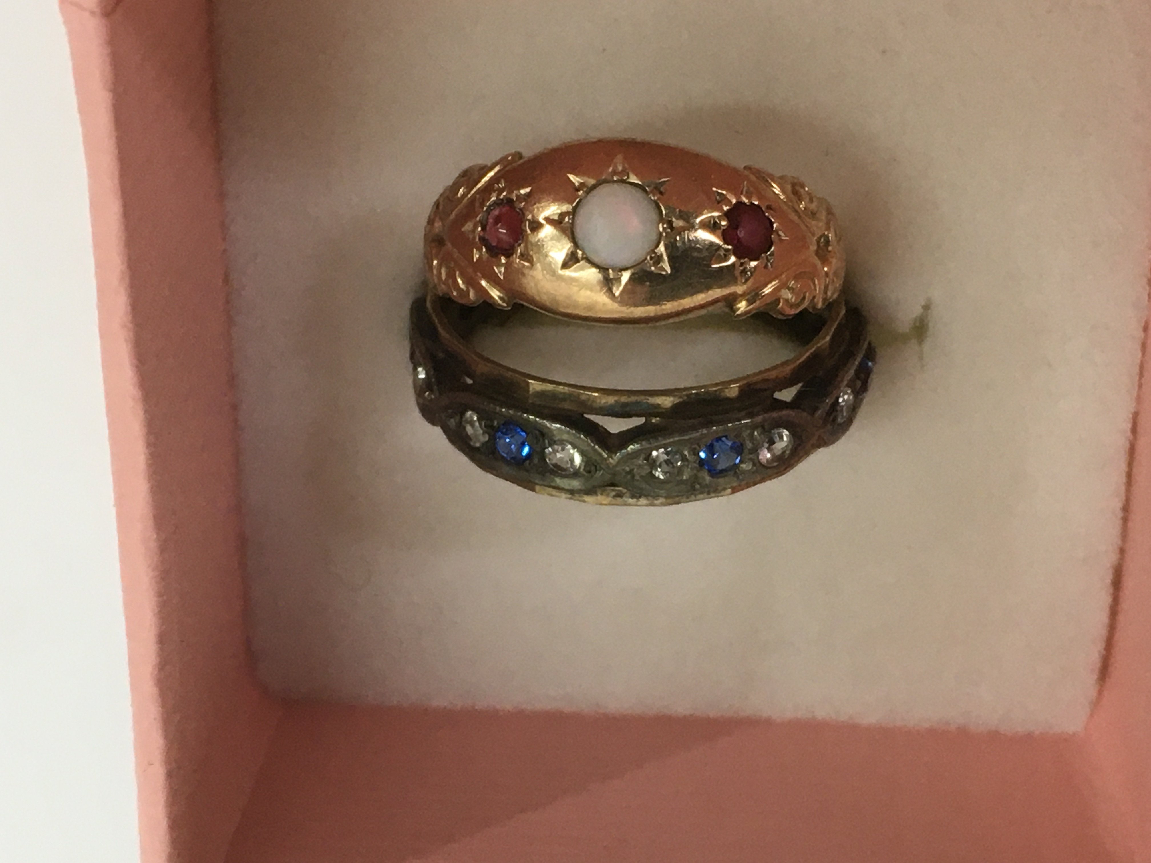 A similar lot of two 9ct gold stone set rings.Appr