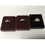 Two 9 ct gold rings and one other